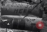 Image of Fallen Japanese soldiers among rocks Iwo Jima, 1945, second 8 stock footage video 65675026273