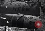 Image of Fallen Japanese soldiers among rocks Iwo Jima, 1945, second 9 stock footage video 65675026273