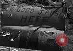 Image of Fallen Japanese soldiers among rocks Iwo Jima, 1945, second 11 stock footage video 65675026273