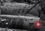 Image of Fallen Japanese soldiers among rocks Iwo Jima, 1945, second 15 stock footage video 65675026273