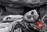 Image of Fallen Japanese soldiers among rocks Iwo Jima, 1945, second 55 stock footage video 65675026273