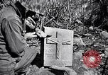 Image of Fallen Japanese soldiers among rocks Iwo Jima, 1945, second 61 stock footage video 65675026273