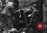 Image of Japanese soldiers surrender to marines Iwo Jima, 1945, second 32 stock footage video 65675026276