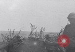 Image of Marines moving along a ridge Iwo Jima, 1945, second 3 stock footage video 65675026281