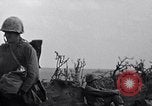 Image of Marines moving along a ridge Iwo Jima, 1945, second 5 stock footage video 65675026281