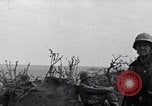 Image of Marines moving along a ridge Iwo Jima, 1945, second 7 stock footage video 65675026281