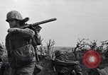 Image of Marines moving along a ridge Iwo Jima, 1945, second 10 stock footage video 65675026281