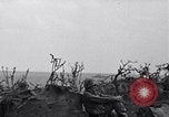 Image of Marines moving along a ridge Iwo Jima, 1945, second 11 stock footage video 65675026281