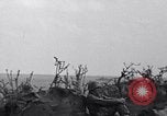 Image of Marines moving along a ridge Iwo Jima, 1945, second 16 stock footage video 65675026281