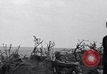 Image of Marines moving along a ridge Iwo Jima, 1945, second 17 stock footage video 65675026281