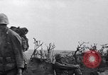 Image of Marines moving along a ridge Iwo Jima, 1945, second 19 stock footage video 65675026281