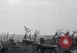 Image of Marines moving along a ridge Iwo Jima, 1945, second 21 stock footage video 65675026281