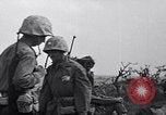 Image of Marines moving along a ridge Iwo Jima, 1945, second 23 stock footage video 65675026281