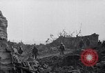 Image of Marines moving along a ridge Iwo Jima, 1945, second 37 stock footage video 65675026281