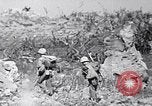 Image of Marines moving along a ridge Iwo Jima, 1945, second 55 stock footage video 65675026281