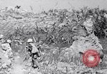 Image of Marines moving along a ridge Iwo Jima, 1945, second 57 stock footage video 65675026281