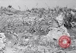 Image of Marines moving along a ridge Iwo Jima, 1945, second 62 stock footage video 65675026281