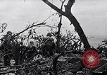 Image of Marines clearing Japanese defenders from a ridge Iwo Jima, 1945, second 12 stock footage video 65675026282
