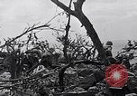 Image of Marines clearing Japanese defenders from a ridge Iwo Jima, 1945, second 18 stock footage video 65675026282