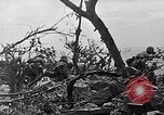 Image of Marines clearing Japanese defenders from a ridge Iwo Jima, 1945, second 19 stock footage video 65675026282