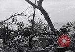 Image of Marines clearing Japanese defenders from a ridge Iwo Jima, 1945, second 26 stock footage video 65675026282