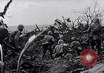 Image of Marines clearing Japanese defenders from a ridge Iwo Jima, 1945, second 31 stock footage video 65675026282