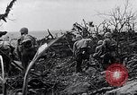 Image of Marines clearing Japanese defenders from a ridge Iwo Jima, 1945, second 35 stock footage video 65675026282