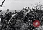 Image of Marines clearing Japanese defenders from a ridge Iwo Jima, 1945, second 36 stock footage video 65675026282