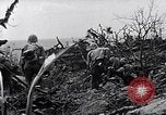 Image of Marines clearing Japanese defenders from a ridge Iwo Jima, 1945, second 37 stock footage video 65675026282