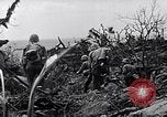 Image of Marines clearing Japanese defenders from a ridge Iwo Jima, 1945, second 38 stock footage video 65675026282