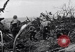 Image of Marines clearing Japanese defenders from a ridge Iwo Jima, 1945, second 39 stock footage video 65675026282