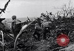 Image of Marines clearing Japanese defenders from a ridge Iwo Jima, 1945, second 41 stock footage video 65675026282