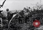 Image of Marines clearing Japanese defenders from a ridge Iwo Jima, 1945, second 42 stock footage video 65675026282