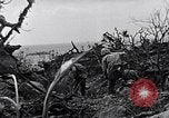 Image of Marines clearing Japanese defenders from a ridge Iwo Jima, 1945, second 46 stock footage video 65675026282