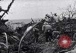 Image of Marines clearing Japanese defenders from a ridge Iwo Jima, 1945, second 49 stock footage video 65675026282