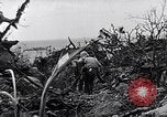 Image of Marines clearing Japanese defenders from a ridge Iwo Jima, 1945, second 52 stock footage video 65675026282