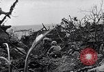 Image of Marines clearing Japanese defenders from a ridge Iwo Jima, 1945, second 55 stock footage video 65675026282