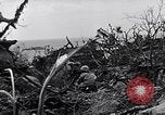 Image of Marines clearing Japanese defenders from a ridge Iwo Jima, 1945, second 56 stock footage video 65675026282