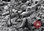 Image of Marines clearing Japanese defenders from a ridge Iwo Jima, 1945, second 62 stock footage video 65675026282