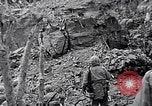 Image of US Marines look for remaining Japanese defenders Iwo Jima, 1945, second 1 stock footage video 65675026283