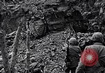 Image of US Marines look for remaining Japanese defenders Iwo Jima, 1945, second 3 stock footage video 65675026283