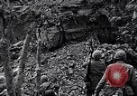 Image of US Marines look for remaining Japanese defenders Iwo Jima, 1945, second 5 stock footage video 65675026283