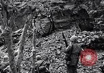 Image of US Marines look for remaining Japanese defenders Iwo Jima, 1945, second 12 stock footage video 65675026283