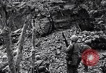 Image of US Marines look for remaining Japanese defenders Iwo Jima, 1945, second 13 stock footage video 65675026283
