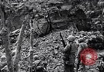 Image of US Marines look for remaining Japanese defenders Iwo Jima, 1945, second 14 stock footage video 65675026283
