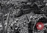 Image of US Marines look for remaining Japanese defenders Iwo Jima, 1945, second 18 stock footage video 65675026283