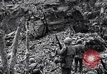 Image of US Marines look for remaining Japanese defenders Iwo Jima, 1945, second 22 stock footage video 65675026283