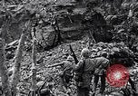Image of US Marines look for remaining Japanese defenders Iwo Jima, 1945, second 24 stock footage video 65675026283
