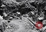 Image of US Marines look for remaining Japanese defenders Iwo Jima, 1945, second 45 stock footage video 65675026283