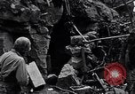 Image of US Marines look for remaining Japanese defenders Iwo Jima, 1945, second 47 stock footage video 65675026283